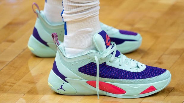 Side view of Luka Doncic's green and blue Jordan Brand shoes.
